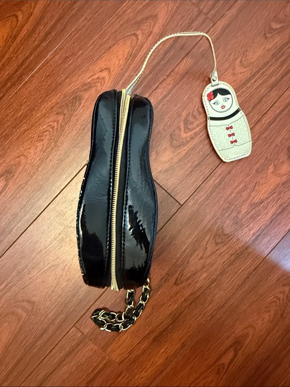 Betsey Johnson Black Patent Doll Face Wristlet with Yellow and Pink Accents
